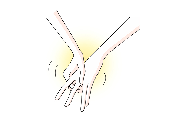 指の間を反対の指で挟んでもほぐす